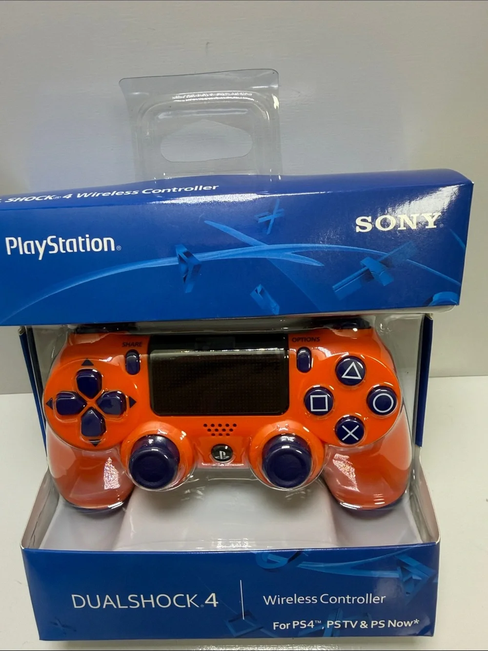 Sony DualShock 4 Wireless Controller - Orange with Dark Blue Buttons